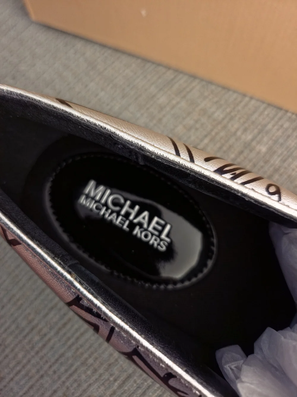 Michael Kors White Slip-On Sneakers with Black Graffiti
